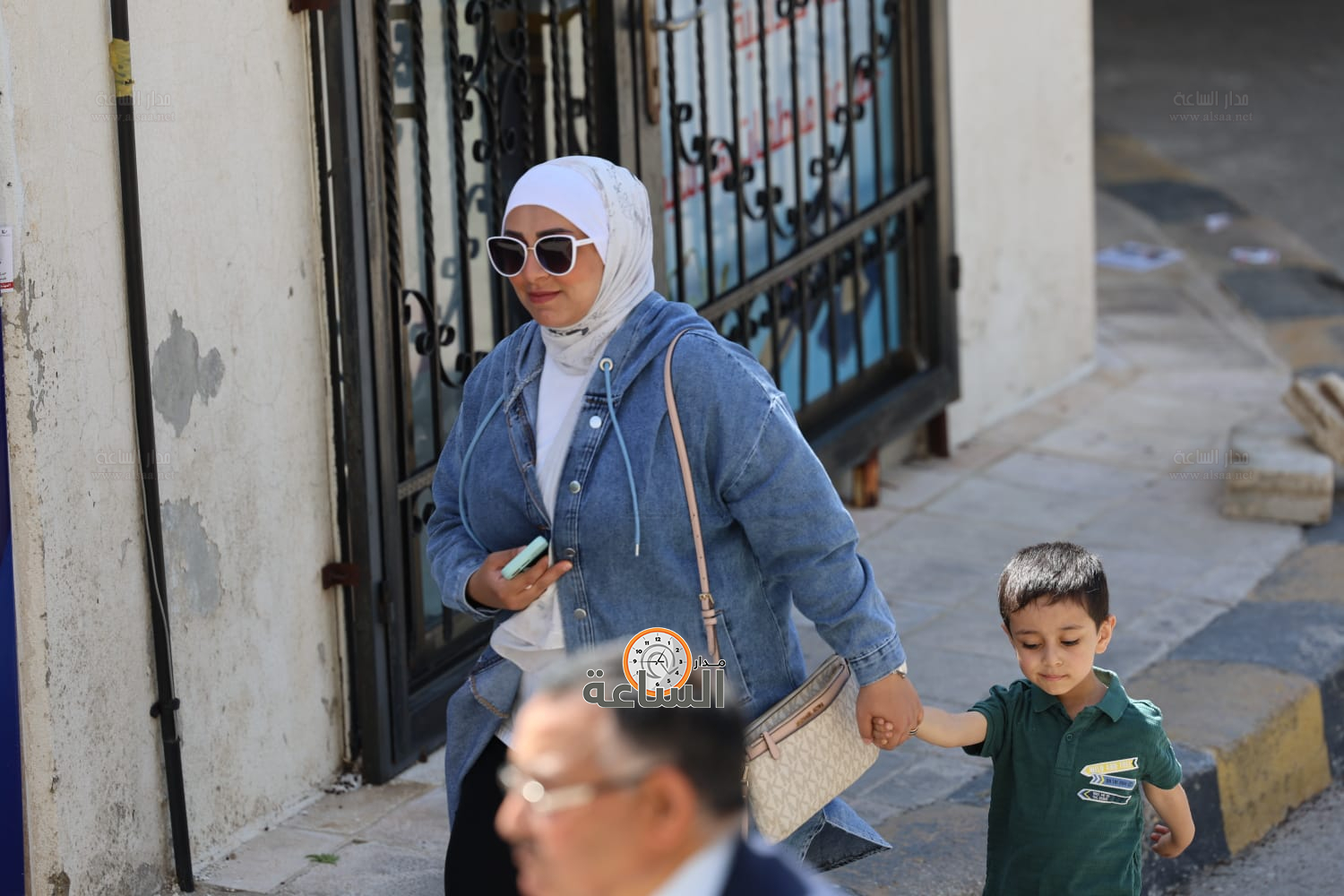 Madar Al-Saa Images 0.9419558773734347