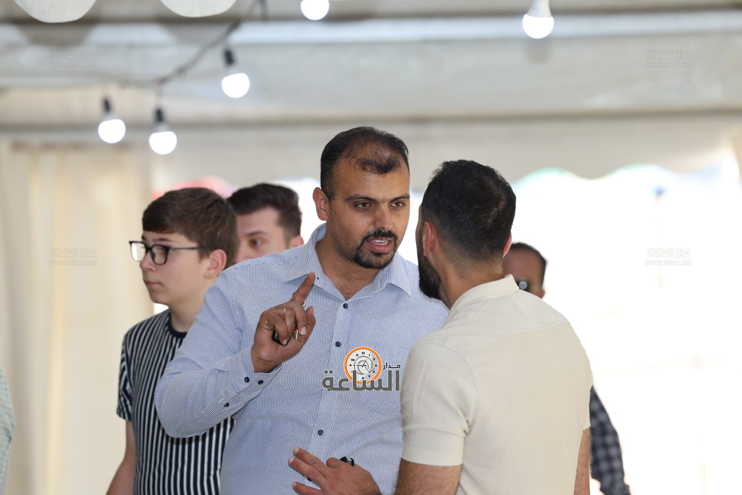 Madar Al-Saa Images 0.9095791136741137