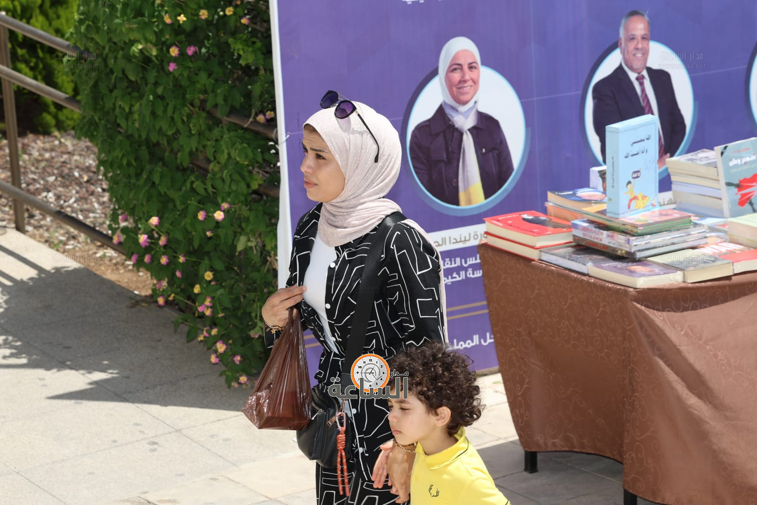 Madar Al-Saa Images 0.96772608366848