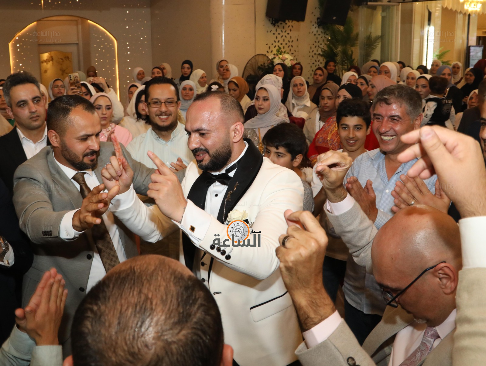 Madar Al-Saa Images 0.7895494734617814