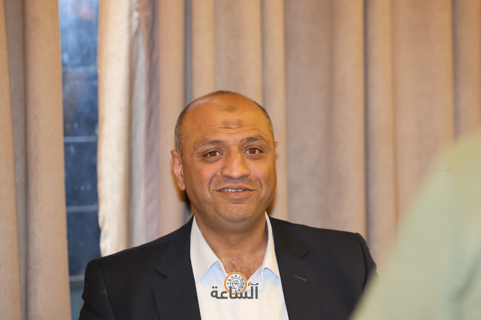 Madar Al-Saa Images 0.702432856150964