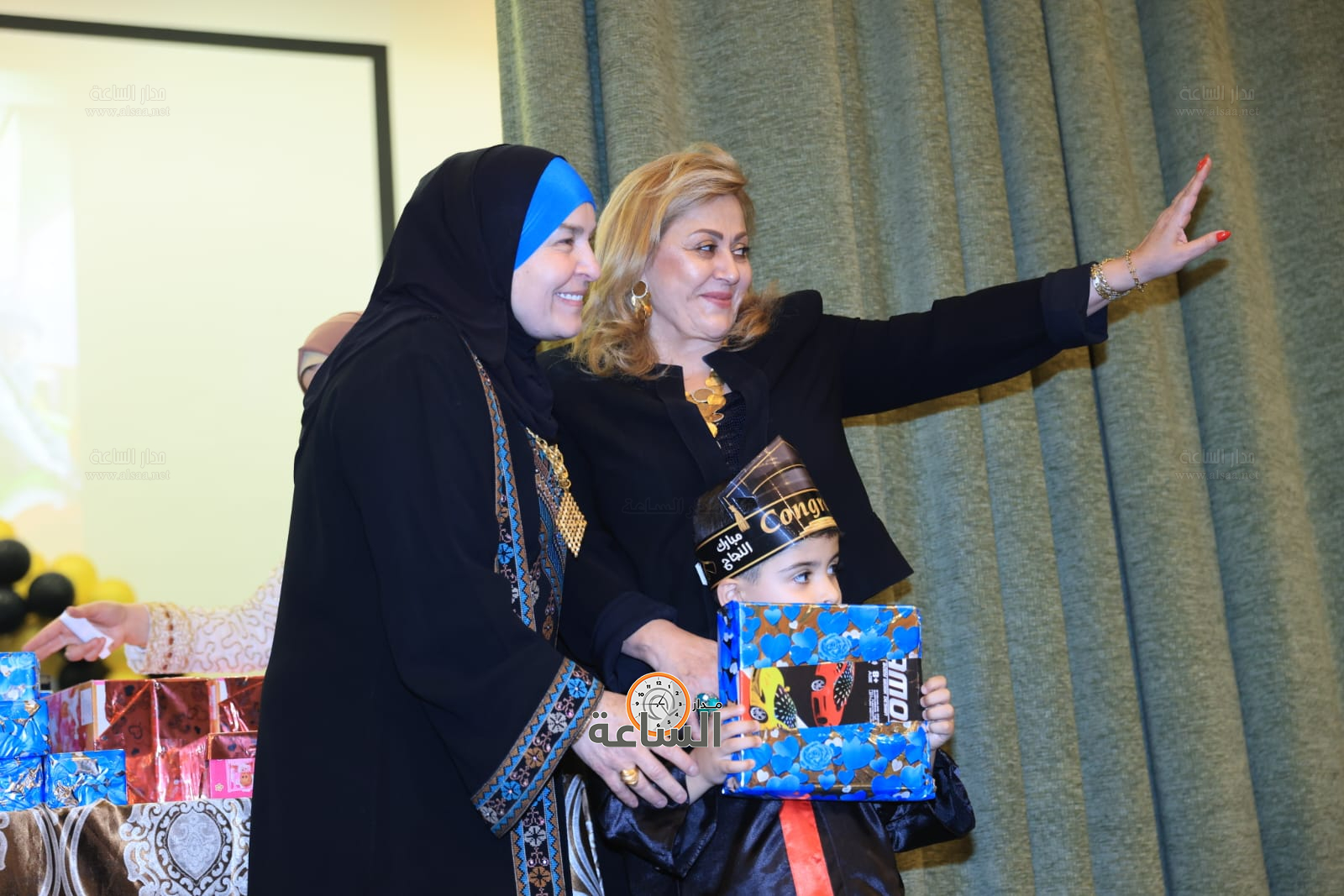 Madar Al-Saa Images 0.0356457067376158