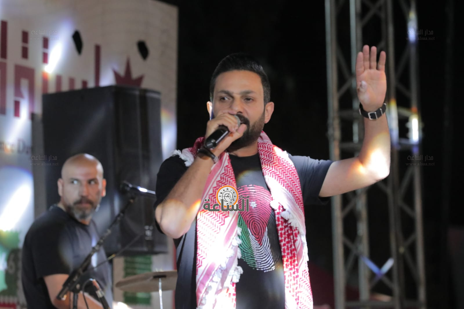 Madar Al-Saa Images 0.7552288944455688