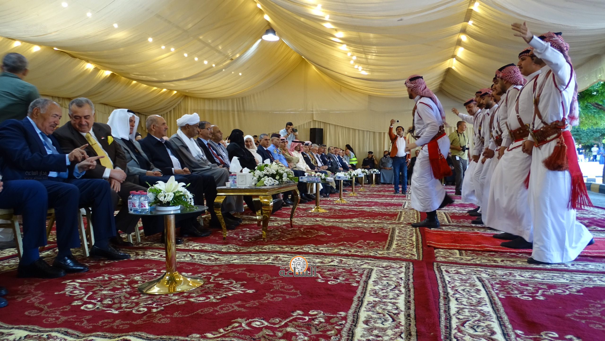 Madar Al-Saa Images 0.7707348369261321