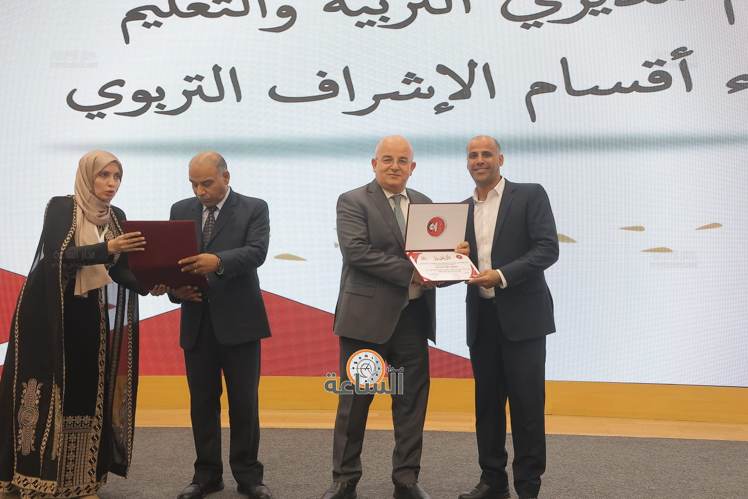 Madar Al-Saa Images 0.7089656829399663