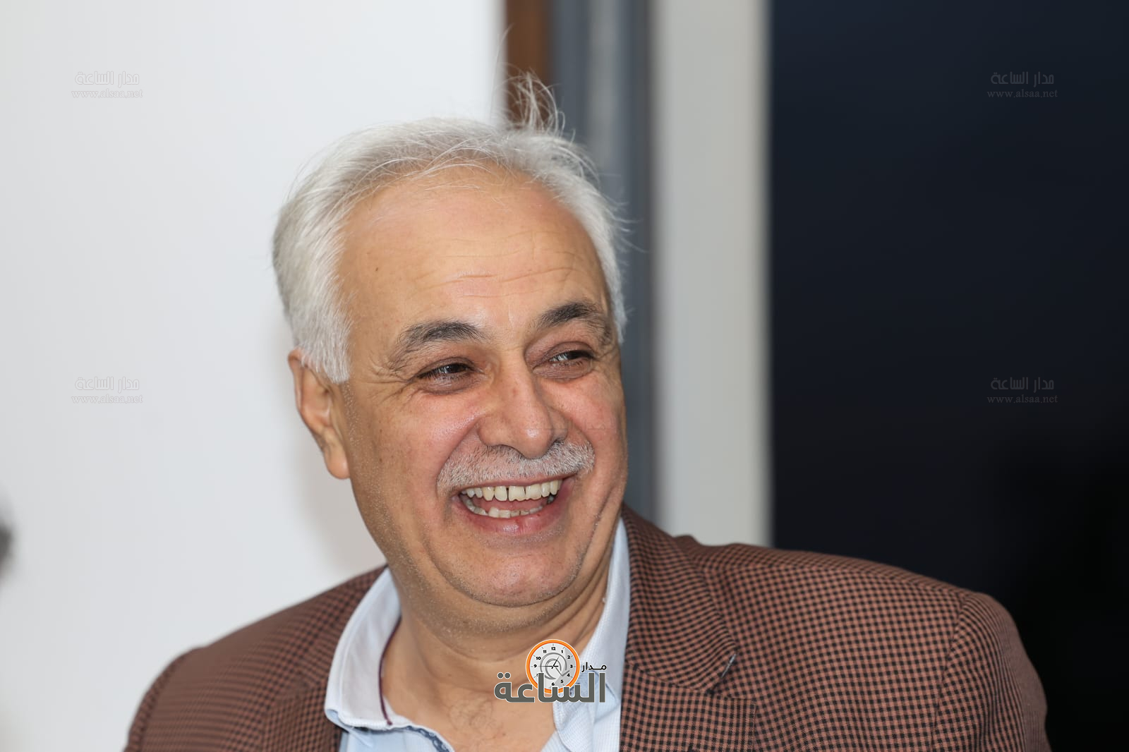 Madar Al-Saa Images 0.4856303744919632