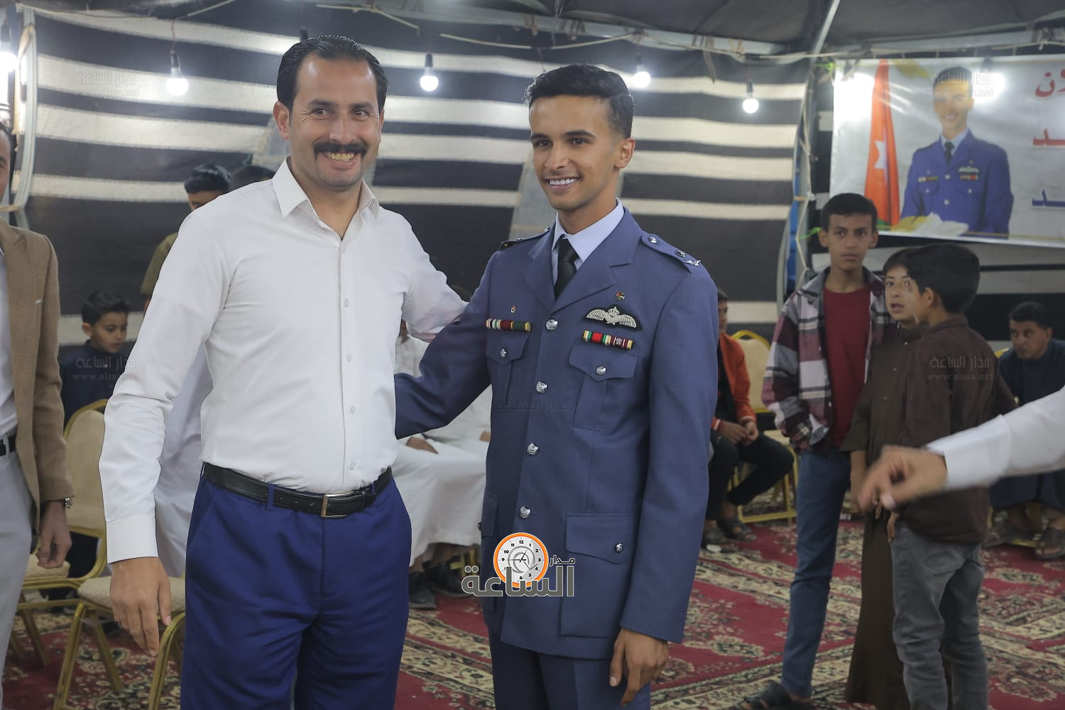 Madar Al-Saa Images 0.48985870636885687