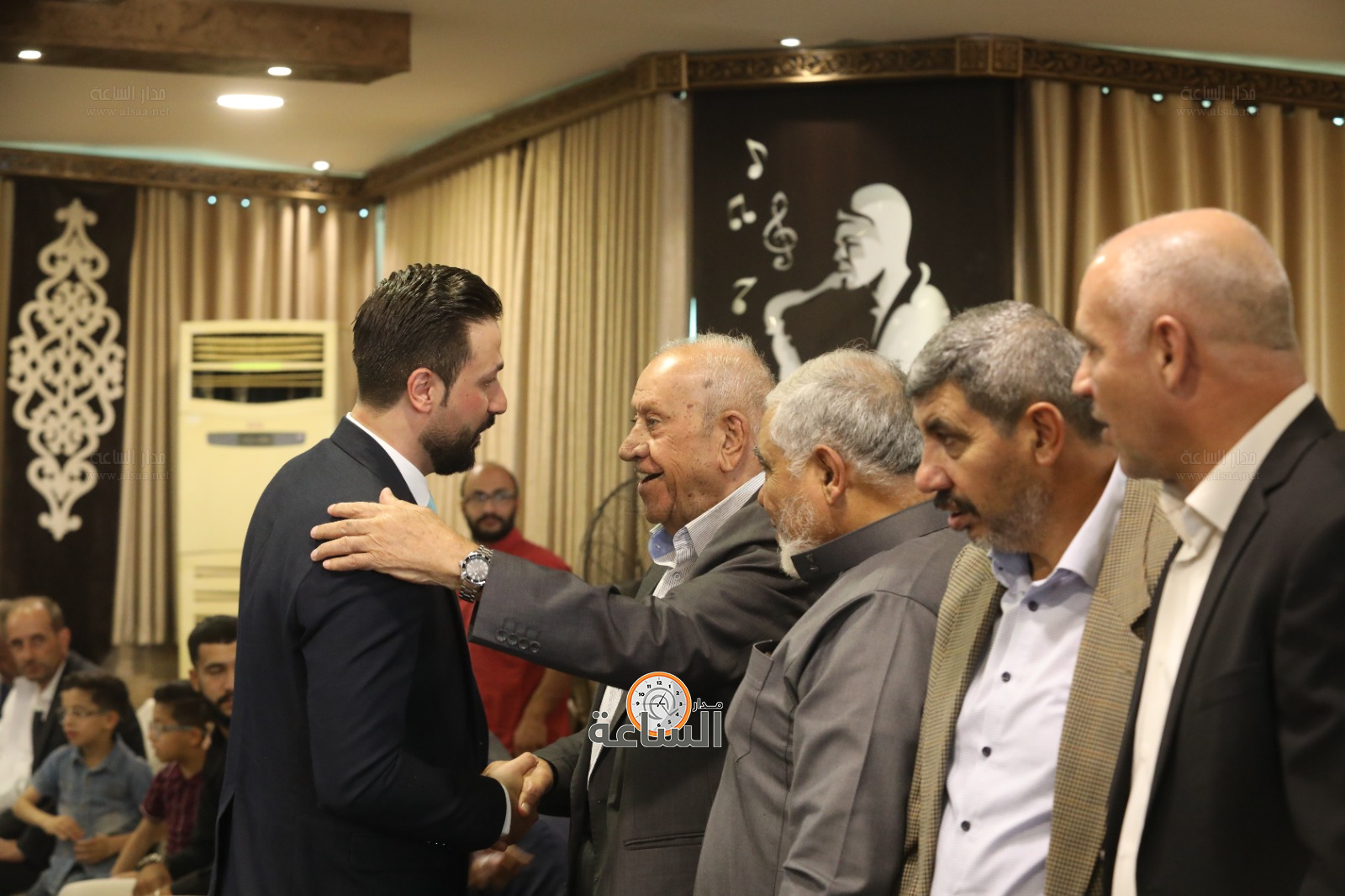 Madar Al-Saa Images 0.3769358010580275