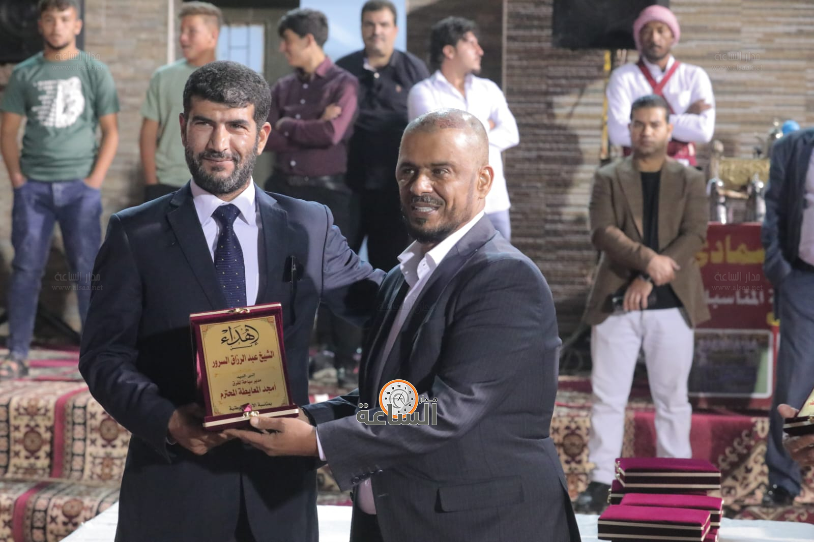 Madar Al-Saa Images 0.6401179379436474