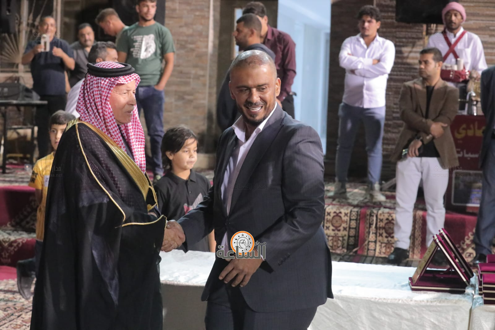 Madar Al-Saa Images 0.8364072623490517