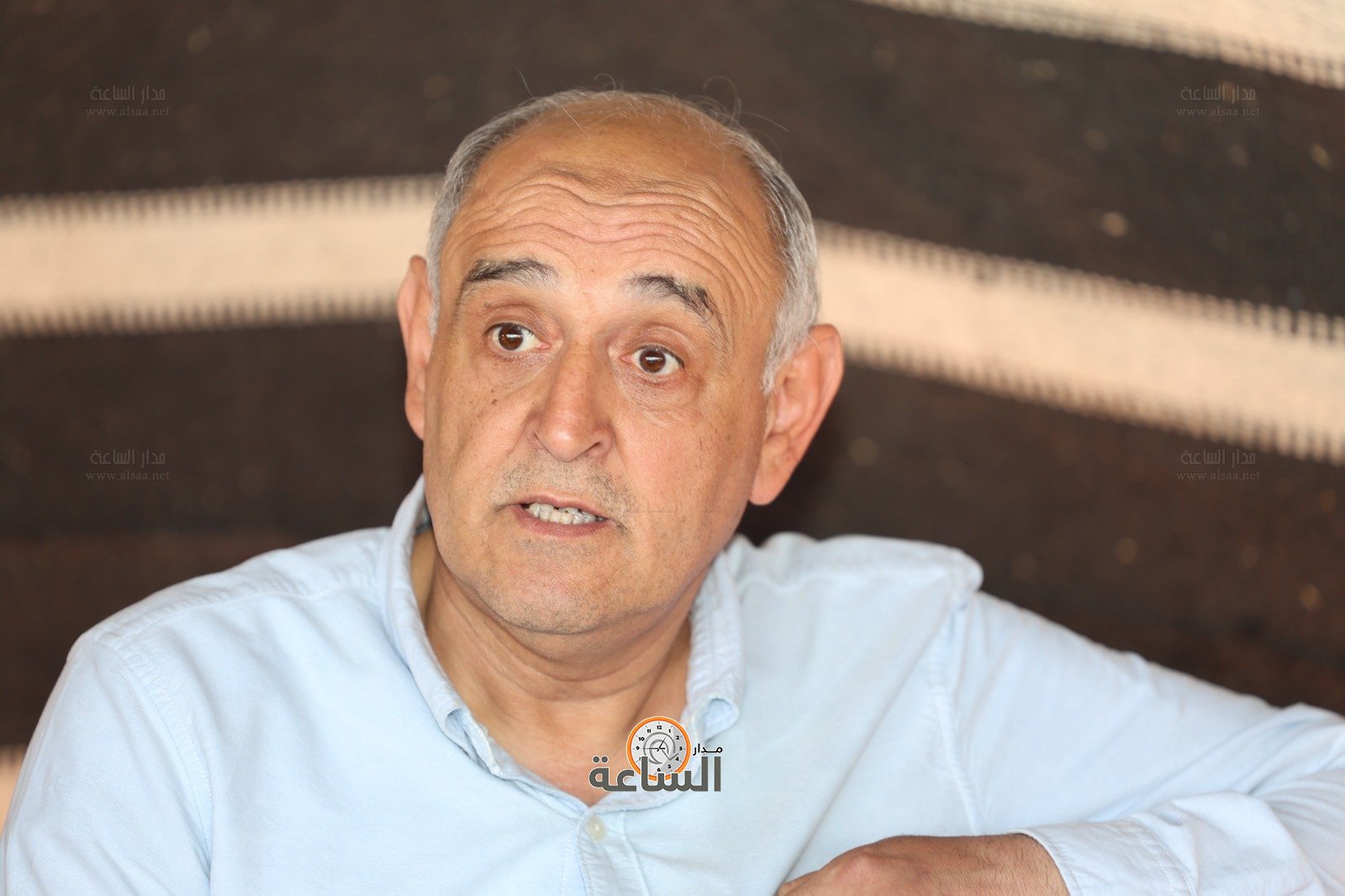 Madar Al-Saa Images 0.0692966470938996