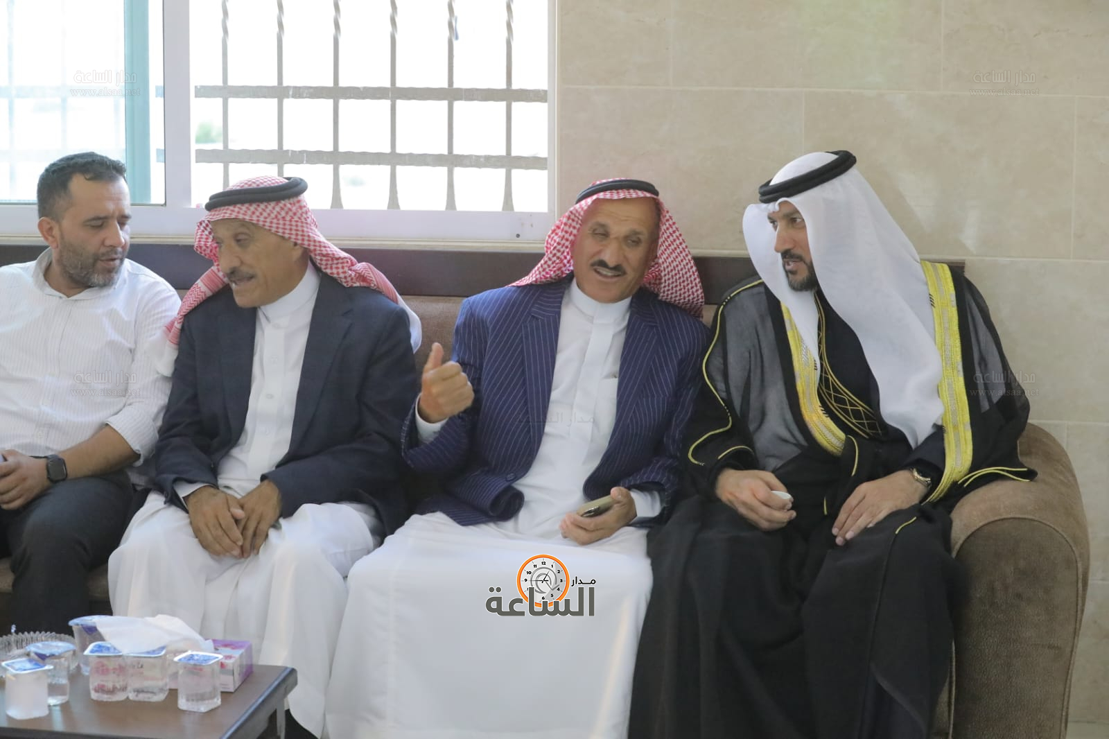 Madar Al-Saa Images 0.5810927383385199