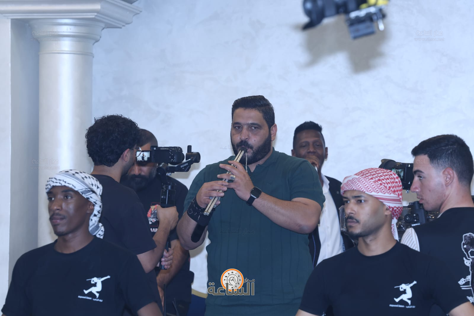 Madar Al-Saa Images 0.3057324538130556