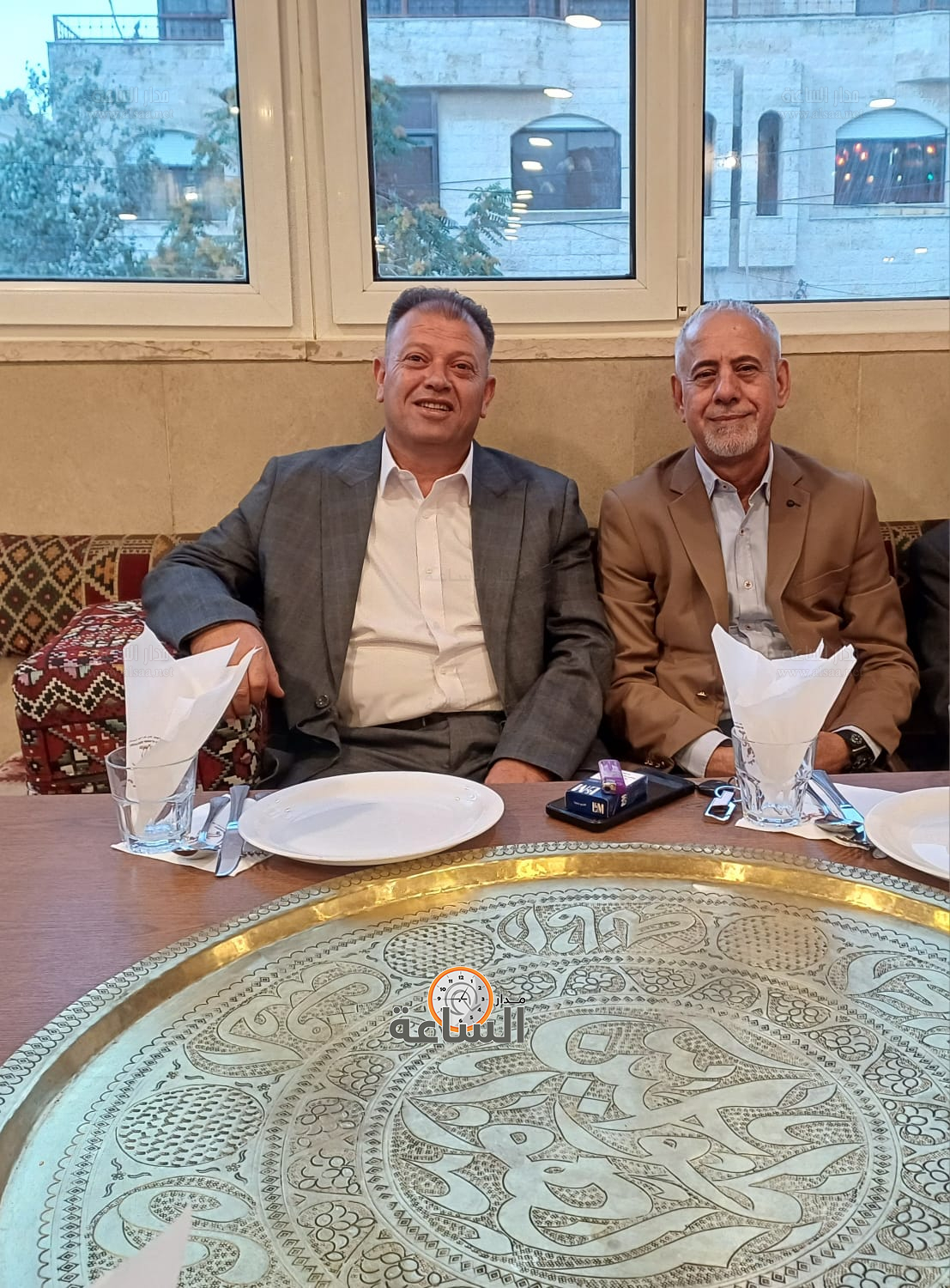 Madar Al-Saa Images 0.5916473652495806