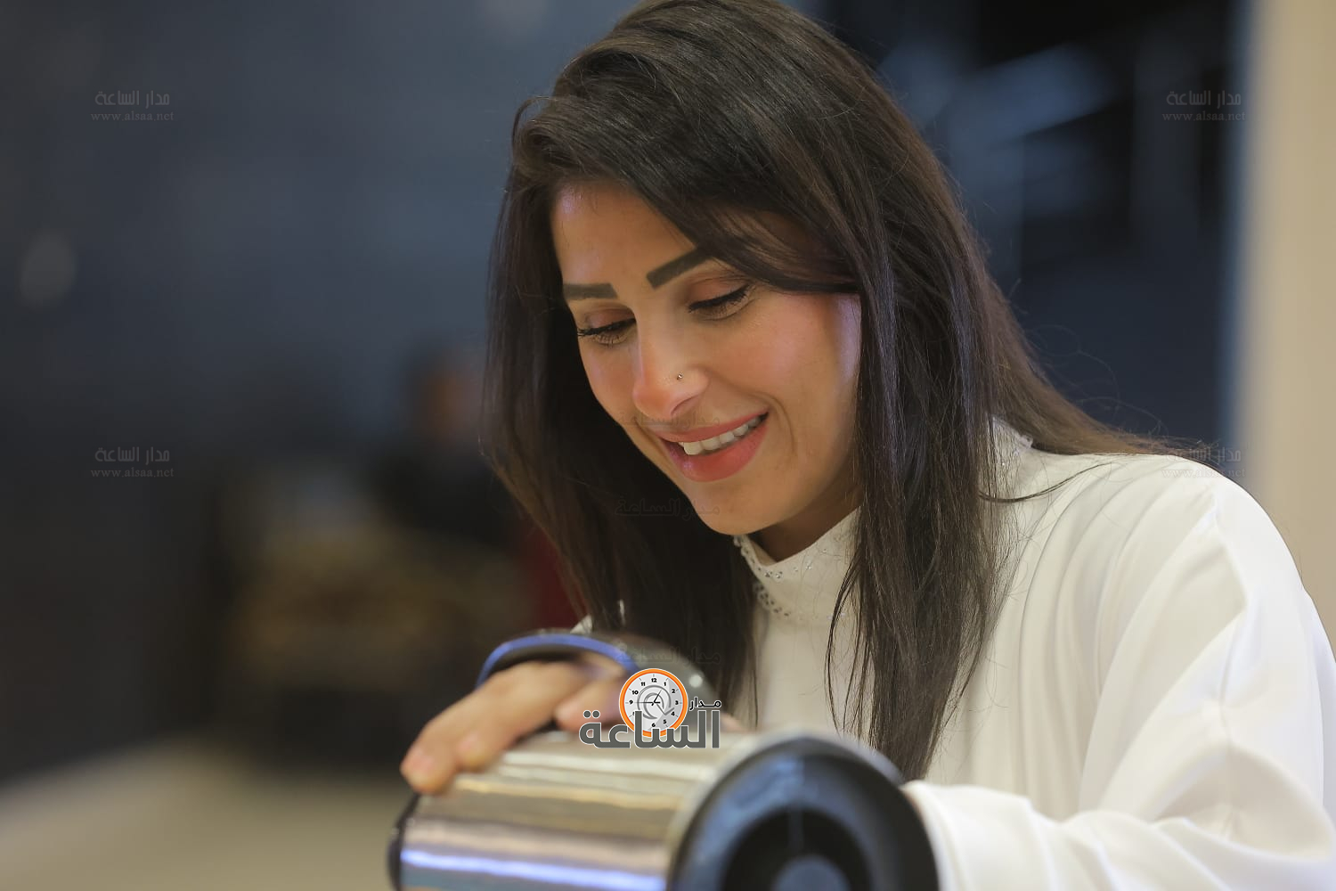 Madar Al-Saa Images 0.7000292089589496