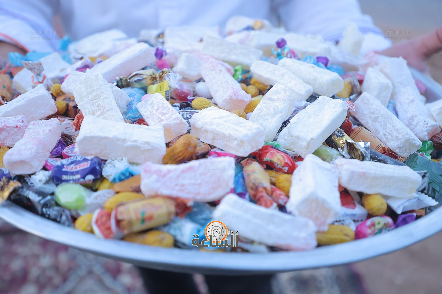 Madar Al-Saa Images 0.4605990284252366