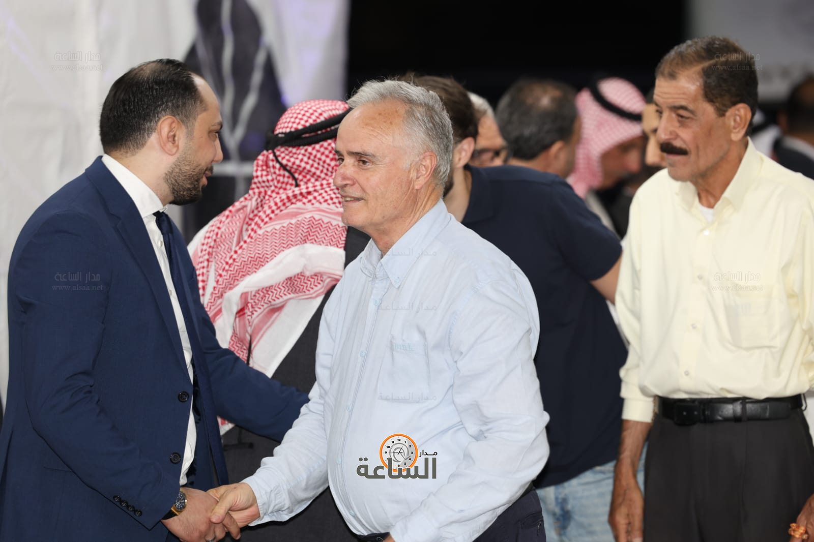 Madar Al-Saa Images 0.47716004162339