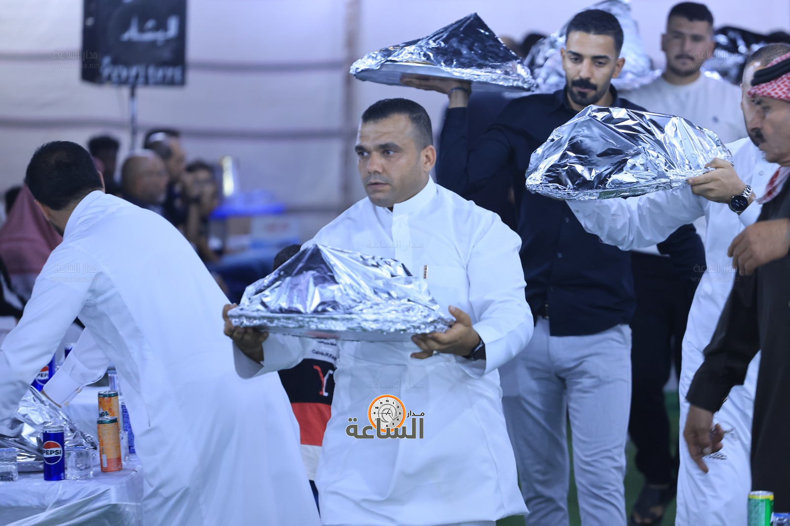 Madar Al-Saa Images 0.6174359548406892