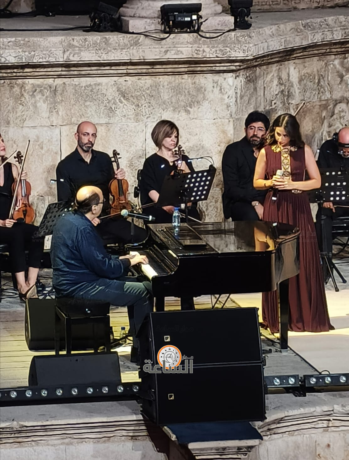 Madar Al-Saa Images 0.477482440227627