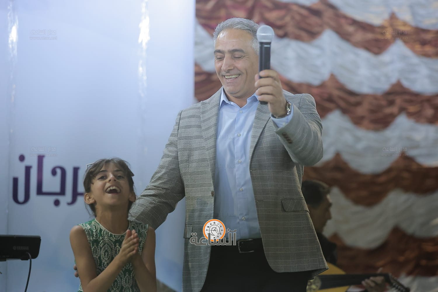 Madar Al-Saa Images 0.42614152312152487