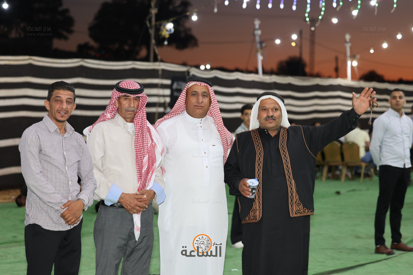 Madar Al-Saa Images 0.0179026614666824