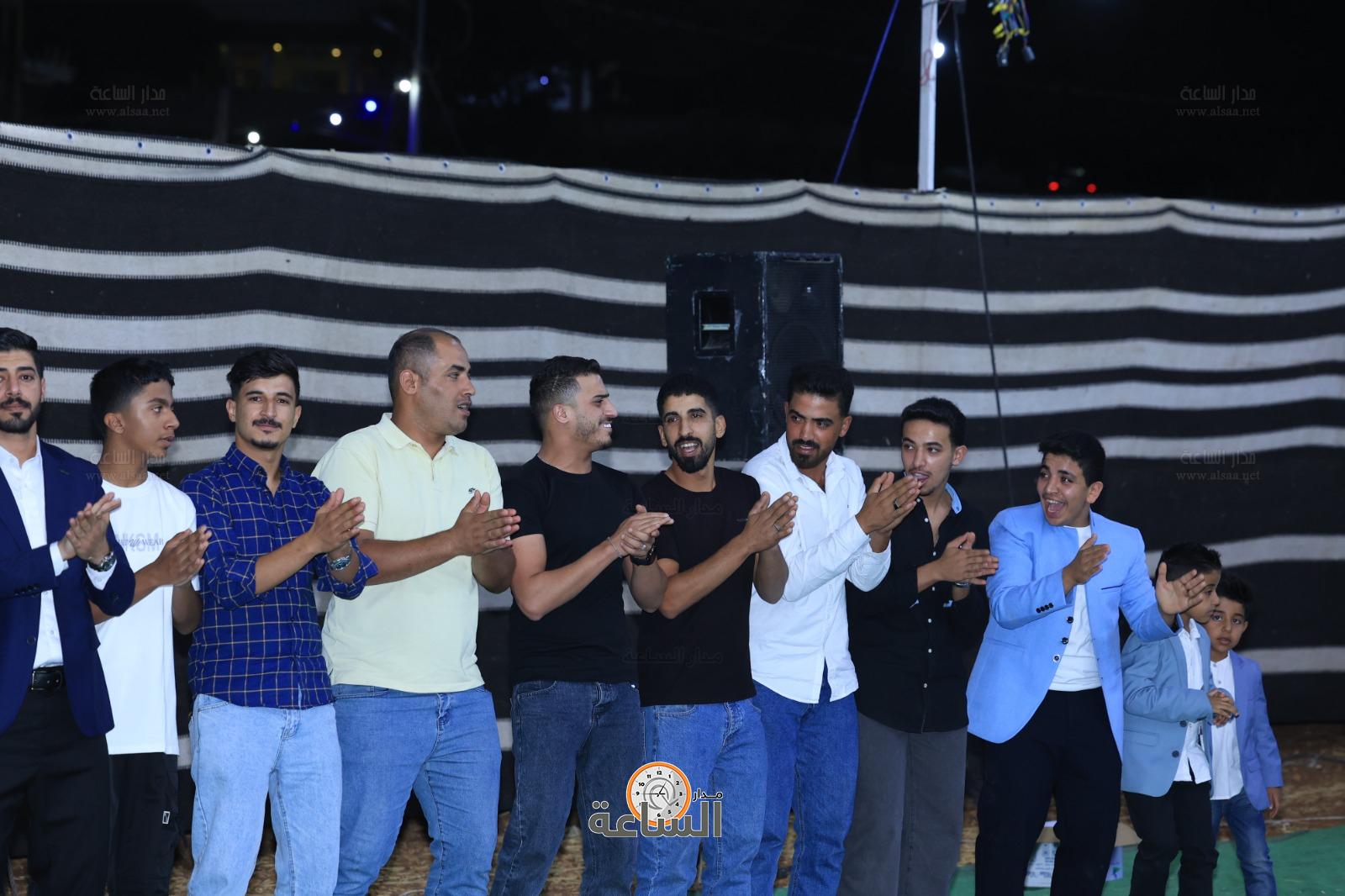 Madar Al-Saa Images 0.00053348433167133