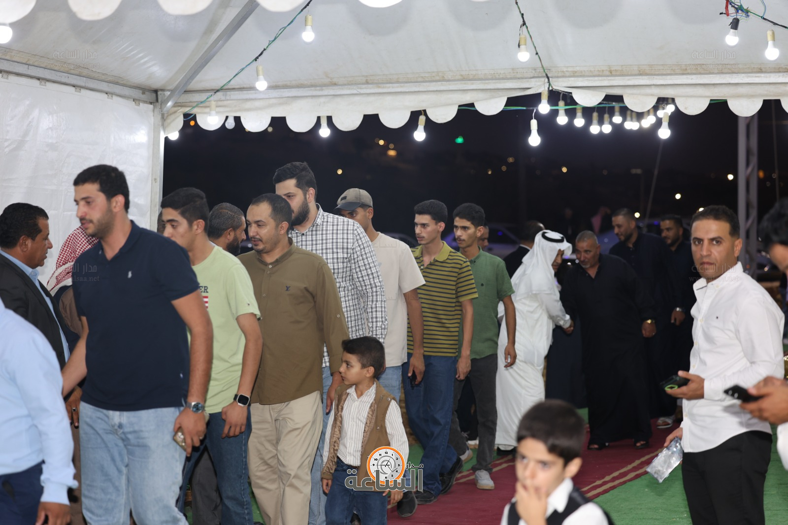 Madar Al-Saa Images 0.22707537816336898