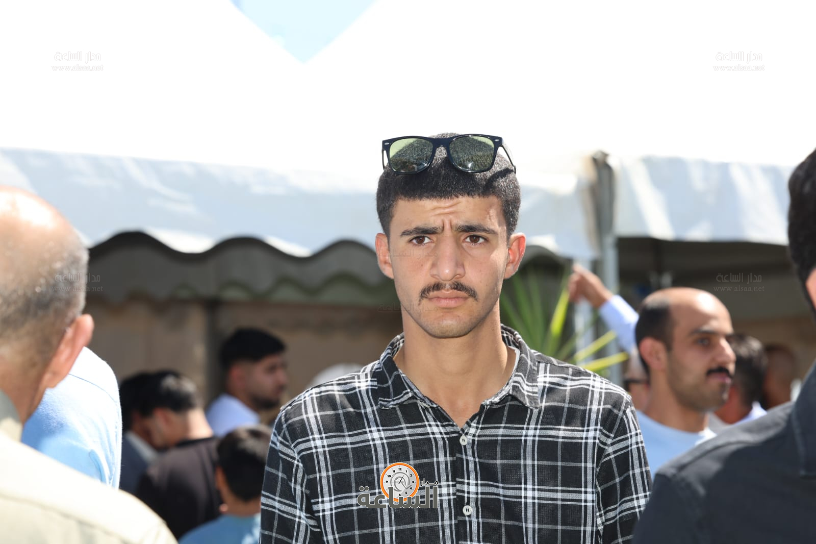 Madar Al-Saa Images 0.2964572321219672