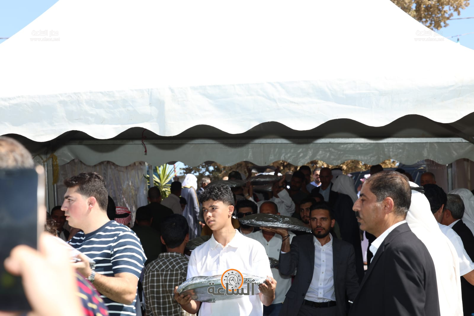 Madar Al-Saa Images 0.9326311875749346