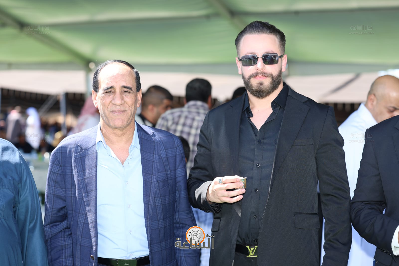 Madar Al-Saa Images 0.6004166444144116