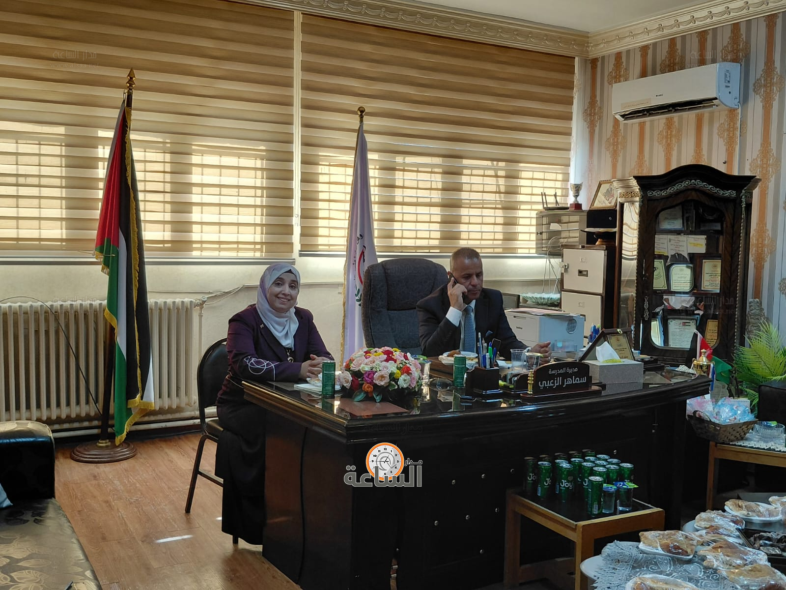 Madar Al-Saa Images 0.5973770327868082