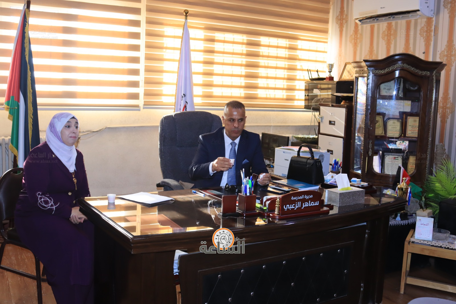 Madar Al-Saa Images 0.59276556359671