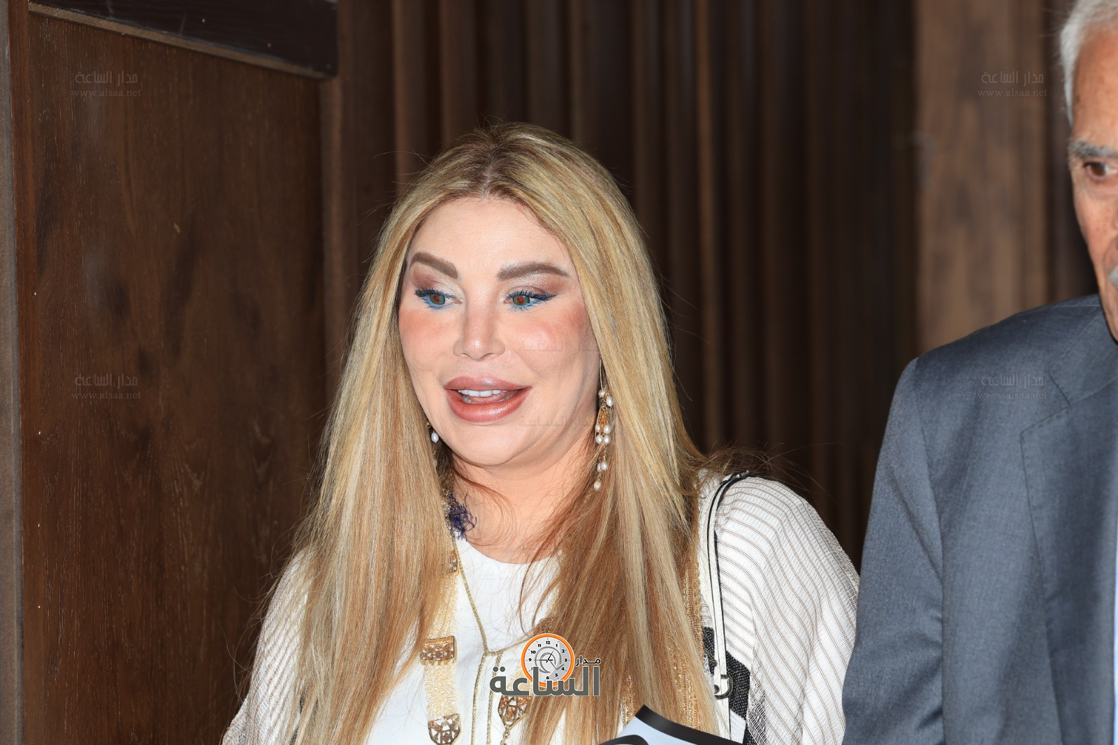 Madar Al-Saa Images 0.690372456139691