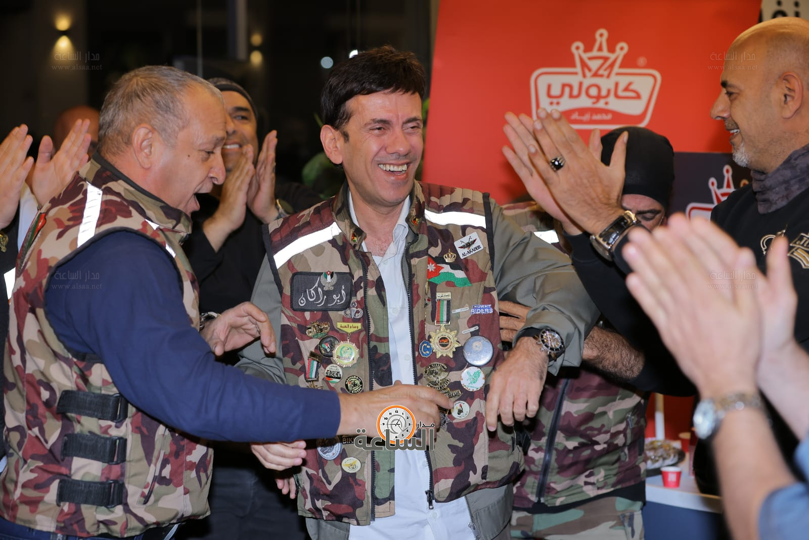 Madar Al-Saa Images 0.043893430303436065