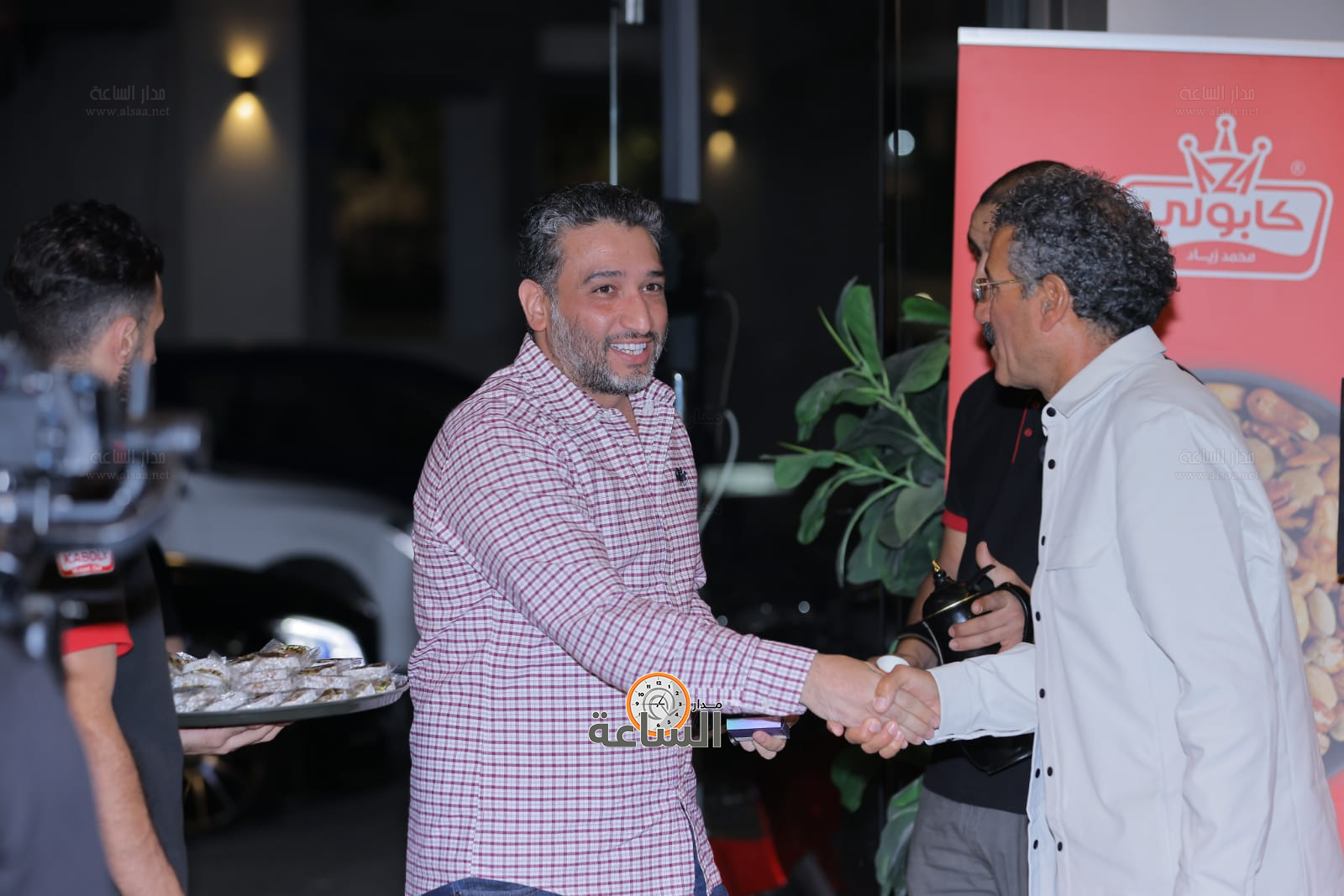 Madar Al-Saa Images 0.14224715900611662