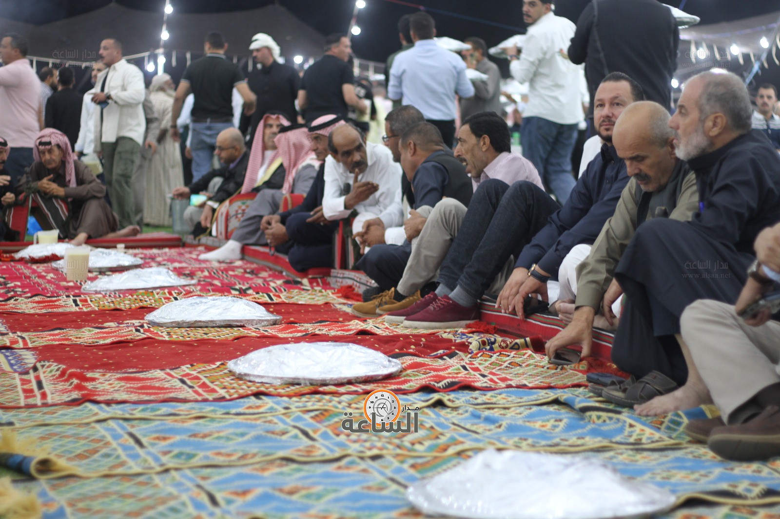 Madar Al-Saa Images 0.3368588759143879