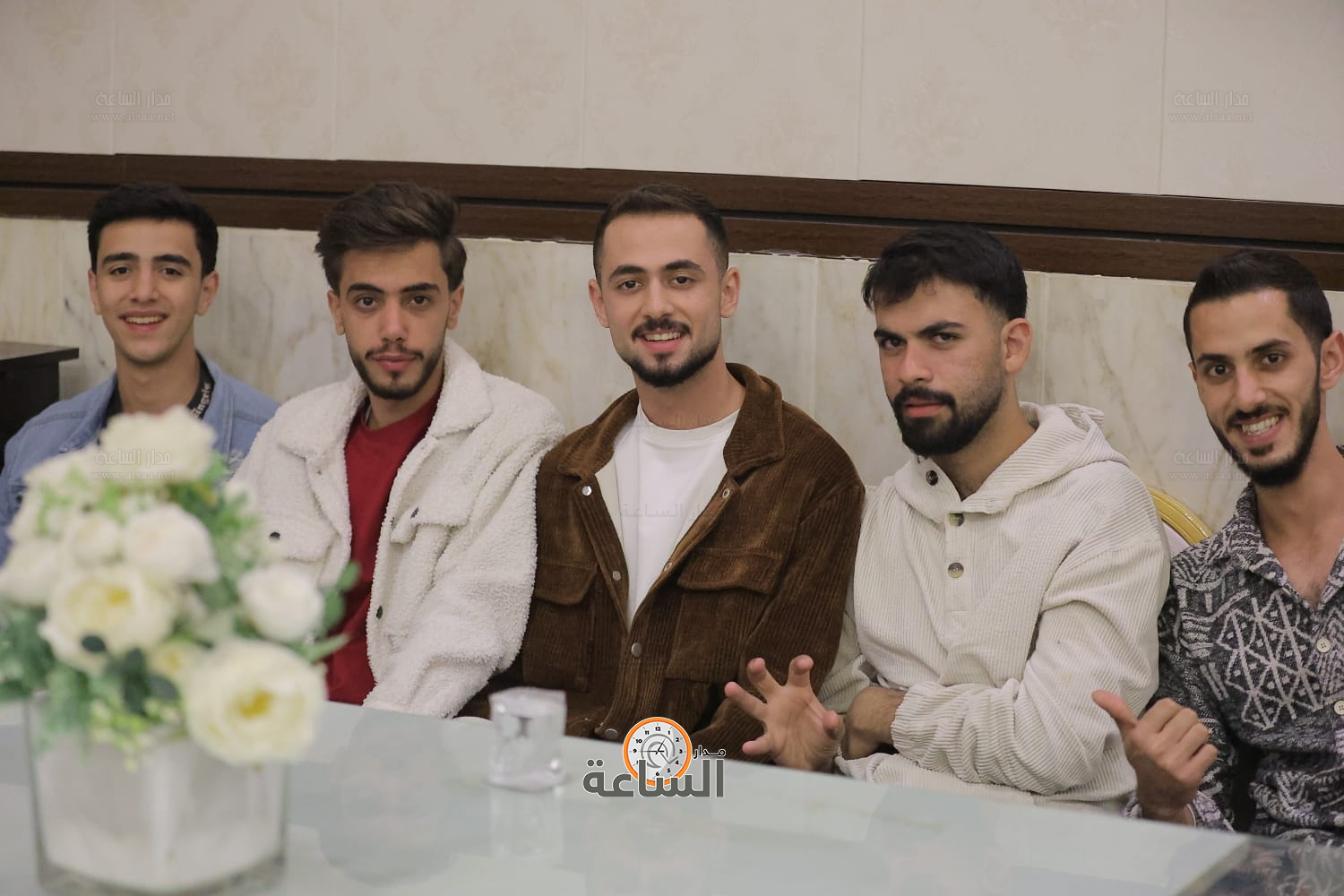 Madar Al-Saa Images 0.38440519714312127