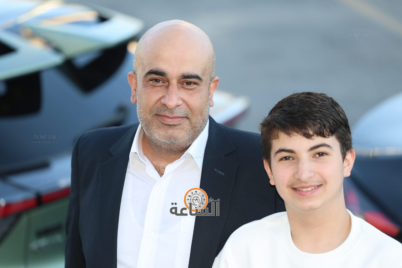 Madar Al-Saa Images 0.40602688335206516