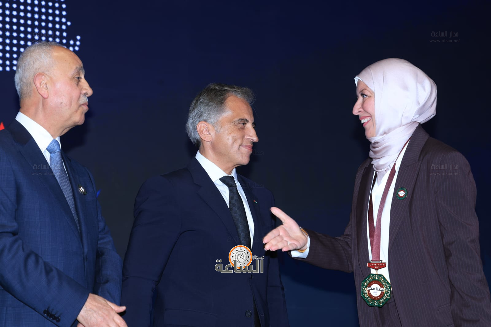 Madar Al-Saa Images 0.6402702672242288