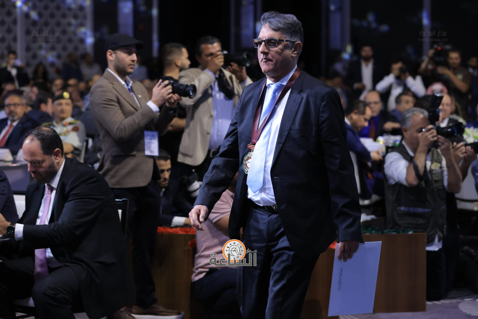 Madar Al-Saa Images 0.4877409968087377