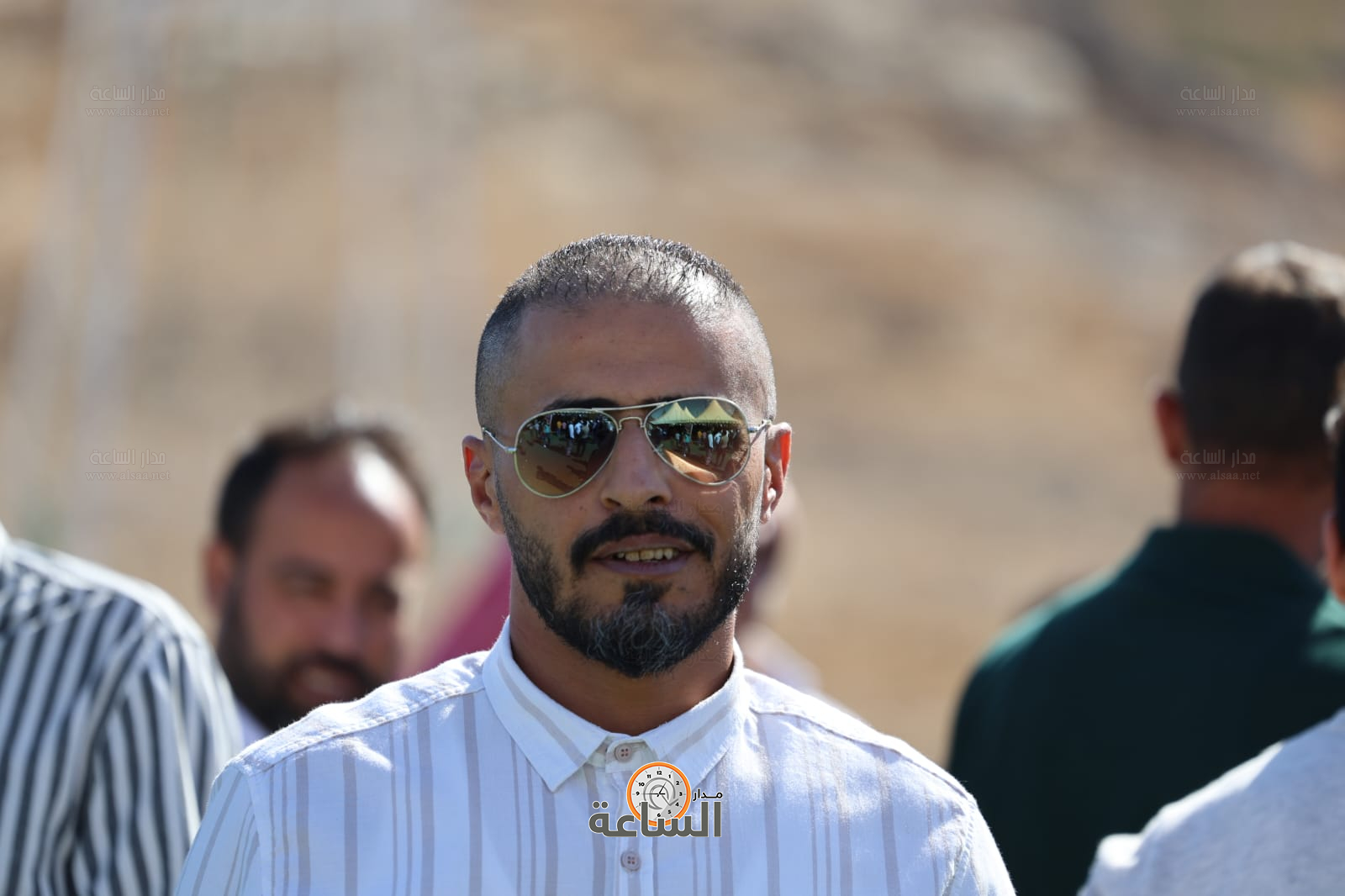 Madar Al-Saa Images 0.7388674766000153