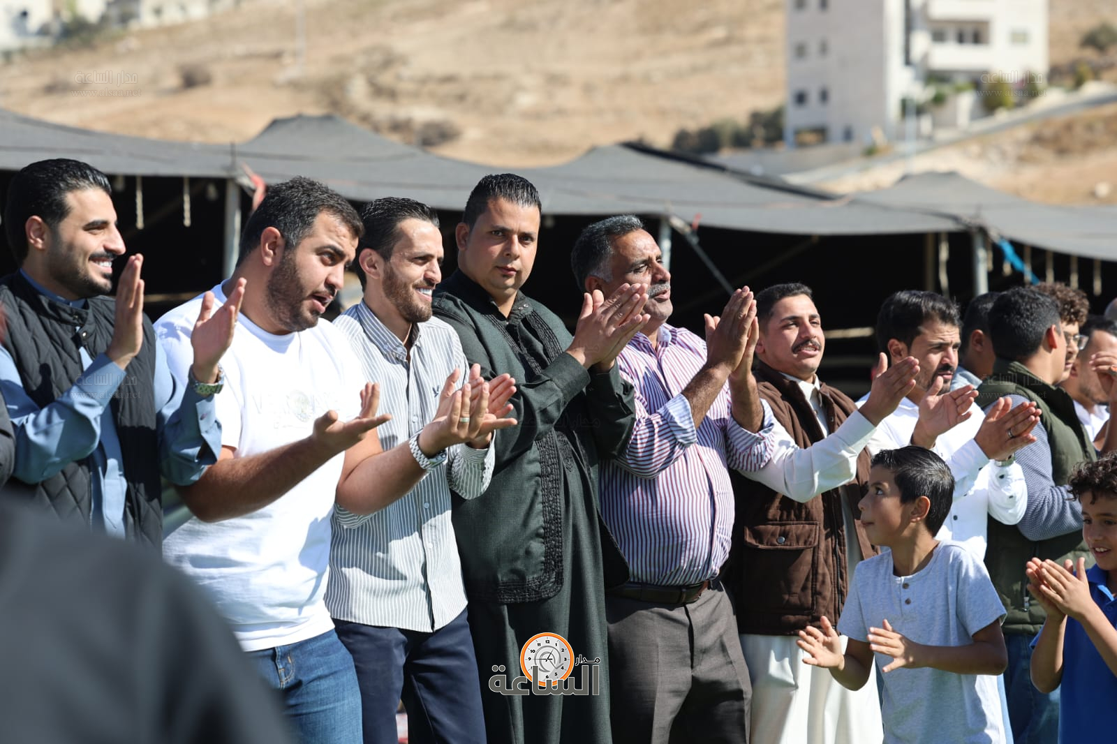 Madar Al-Saa Images 0.564216355170135