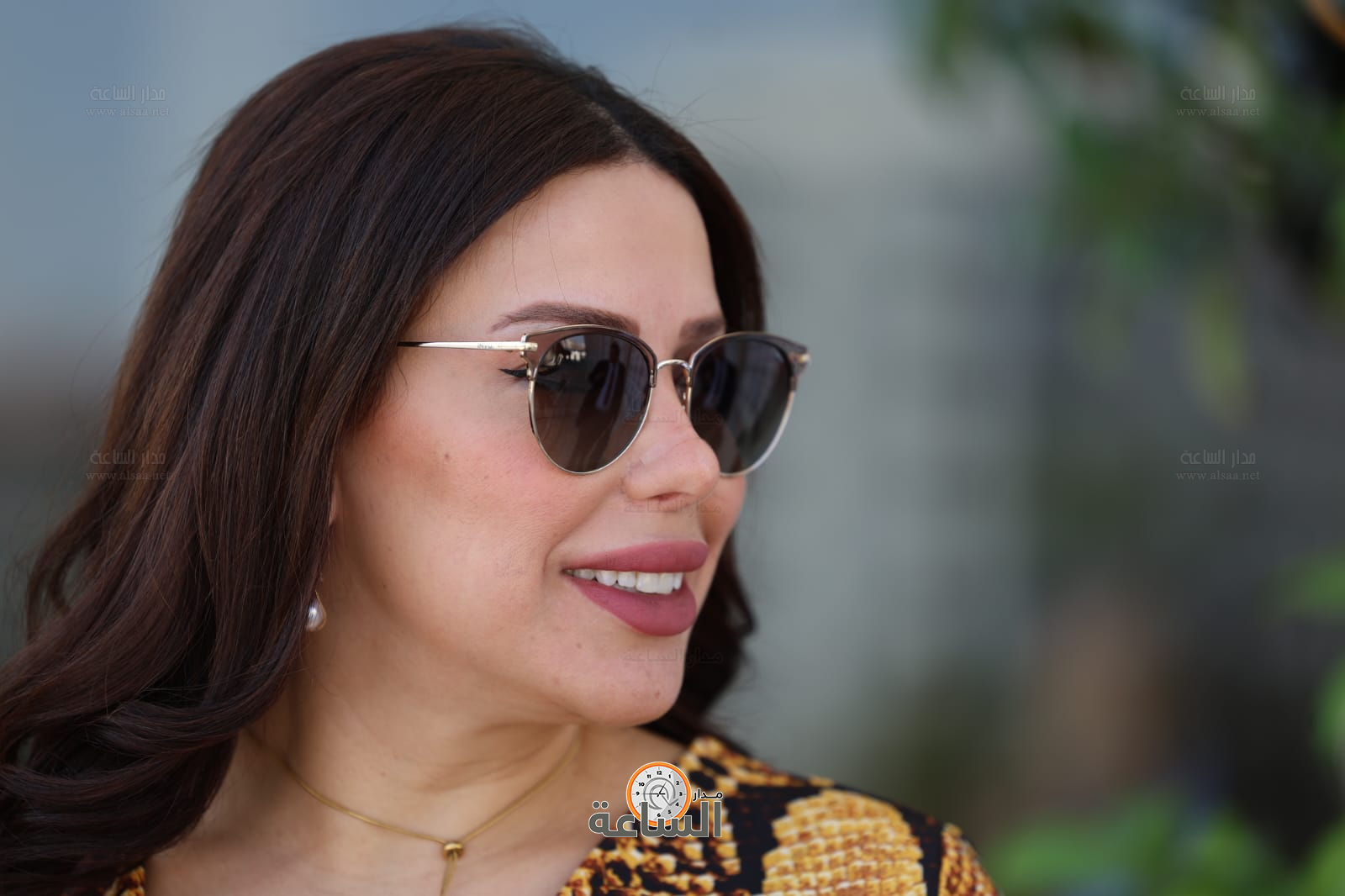 Madar Al-Saa Images 0.385512348211824