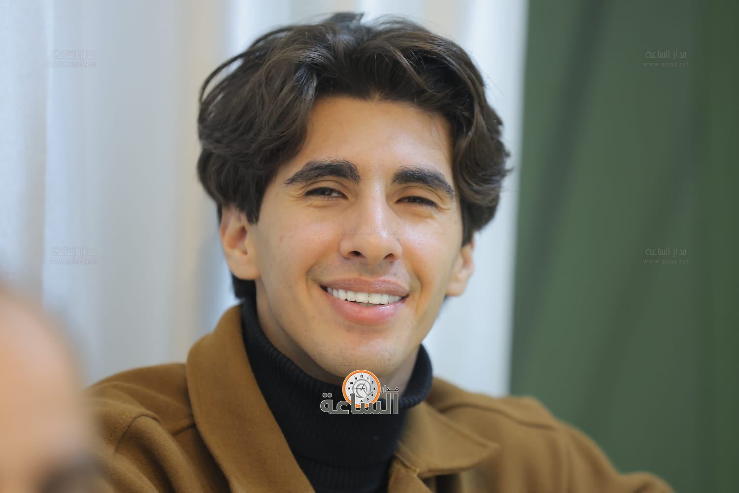 Madar Al-Saa Images 0.8556281403449445