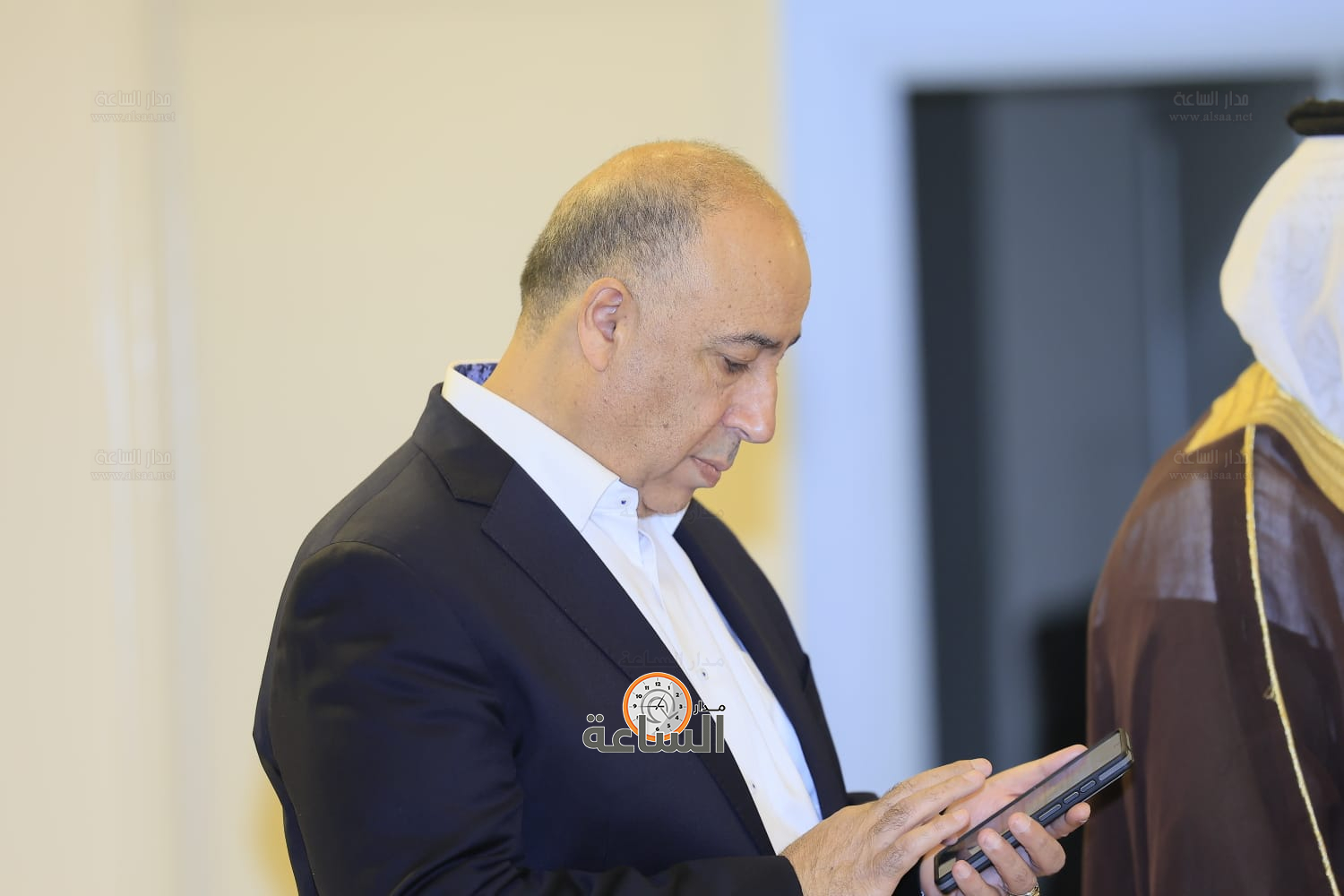 Madar Al-Saa Images 0.570372441063377