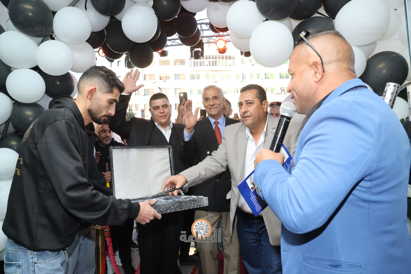 Madar Al-Saa Images 0.8056385259256154