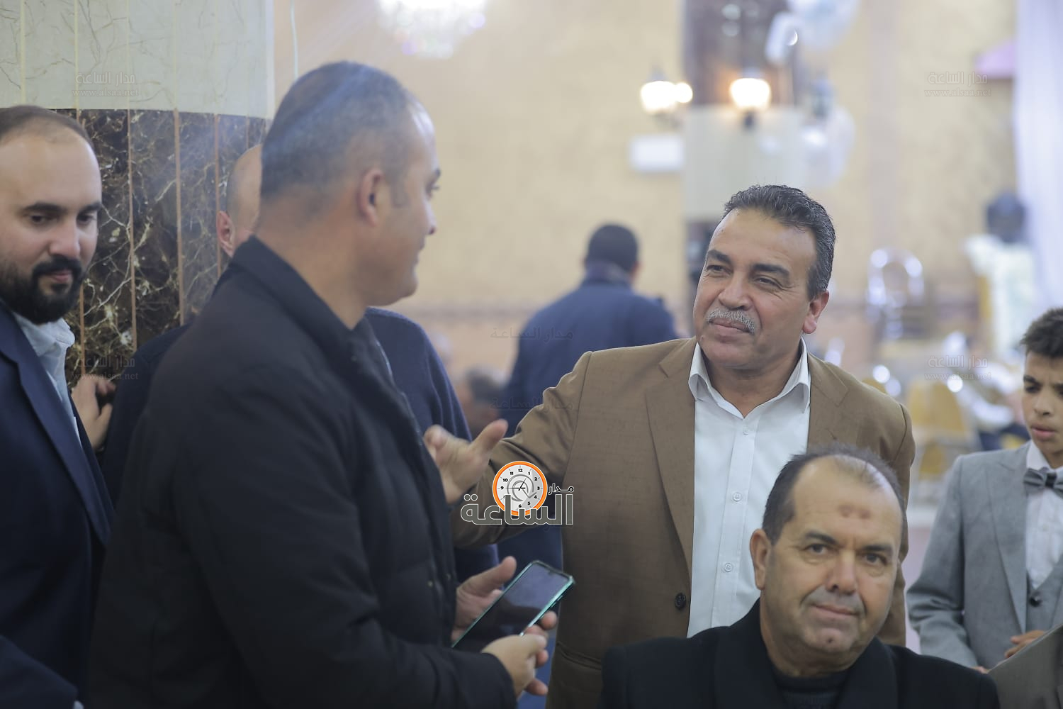 Madar Al-Saa Images 0.6931642722845885