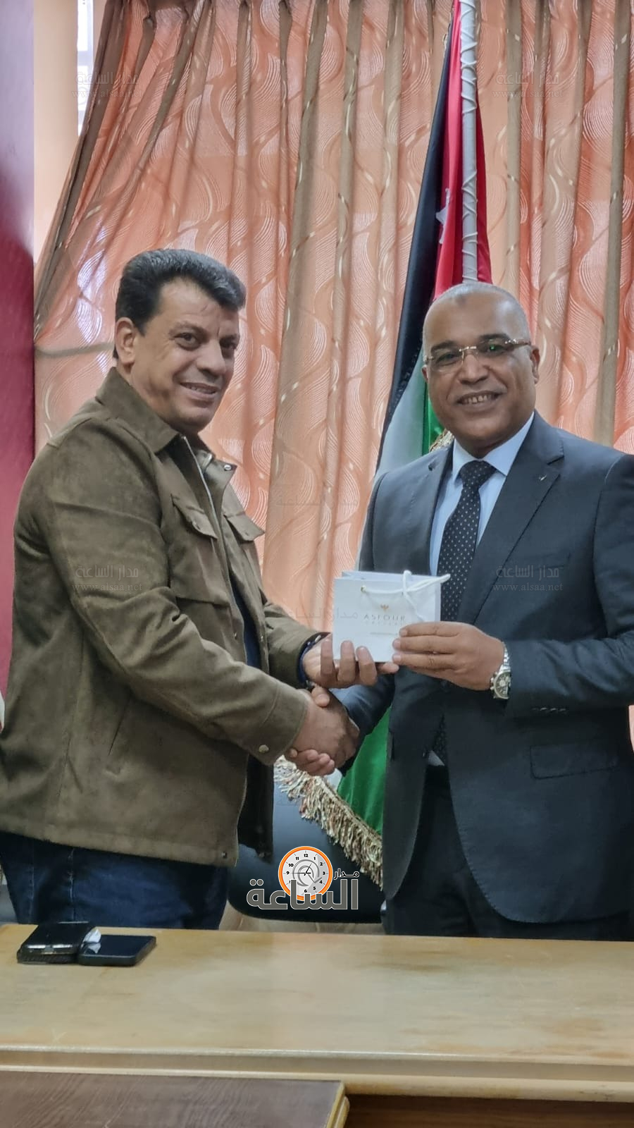 Madar Al-Saa Images 0.5701413896124051