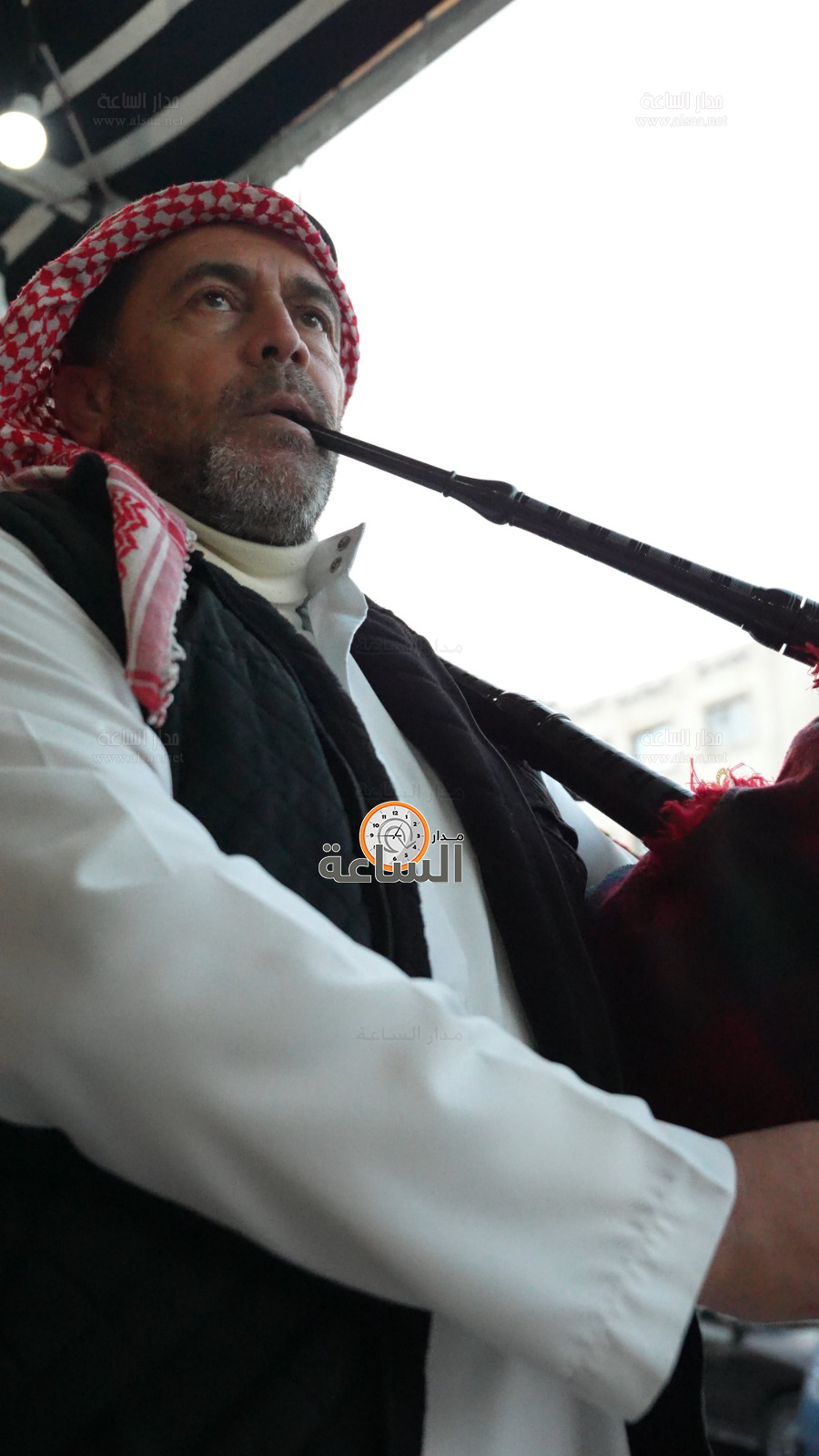 Madar Al-Saa Images 0.0934784742142647