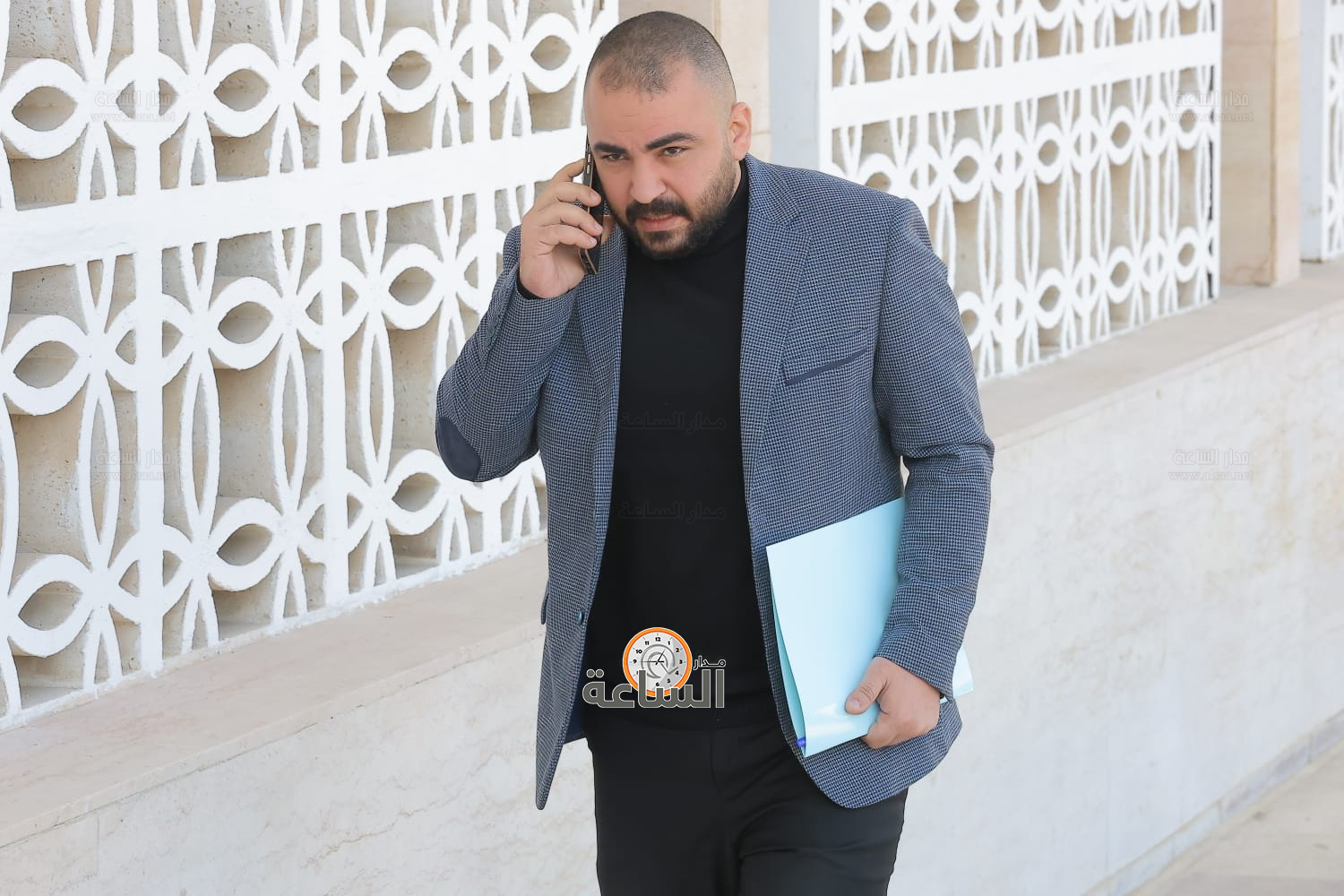 Madar Al-Saa Images 0.18847636096094877